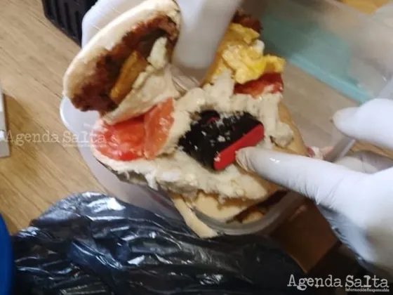Estaba duro el sándwich: mujer intentó ingresar un celular en medio de una hamburguesa para un preso