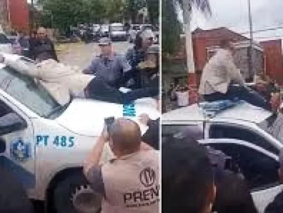 ESCÁNDALO: un concejal de Chaco se subió al techo de un patrullero para evitar que desalojaran una protesta